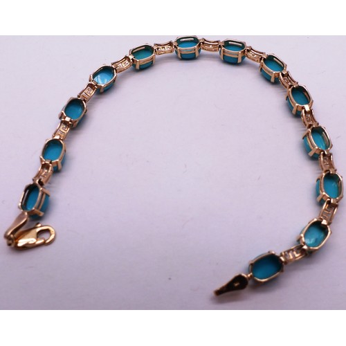 411 - 9 CARAT GOLD AND TURQUOISE BRACELET- 5GRAMS