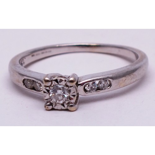 414 - 9ct WHITE GOLD AND DIAMOND LADIES RING- SIZE N- 2.42G