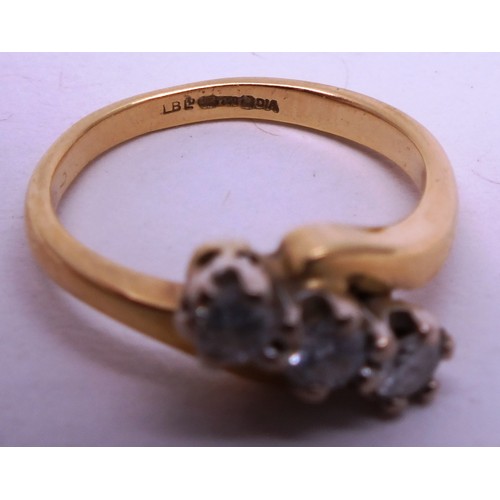 415 - 18 CARAT TRIPLE DIAMOND GOLD RING- 3.47G