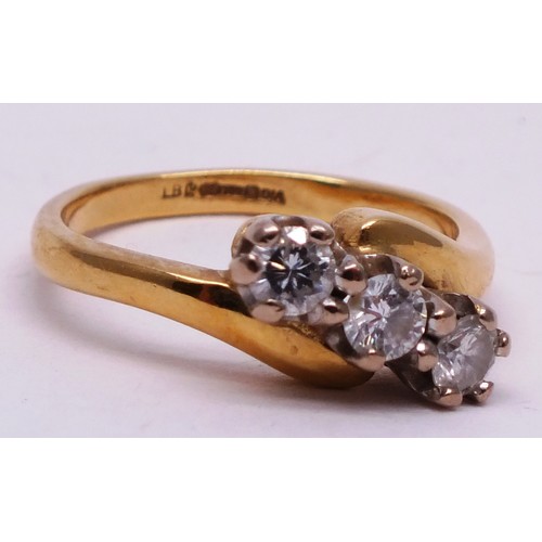 415 - 18 CARAT TRIPLE DIAMOND GOLD RING- 3.47G