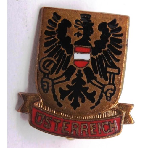 457 - TWO GERMAN BADGES INCLUDES 1935 OSTERREICH