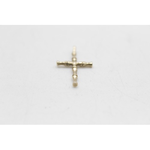 128 - 9ct gold vintage textured cross pendant (1.4g)