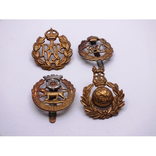 242 - FOUR MILITARY CAP BADGES INCLUDING R.A.F