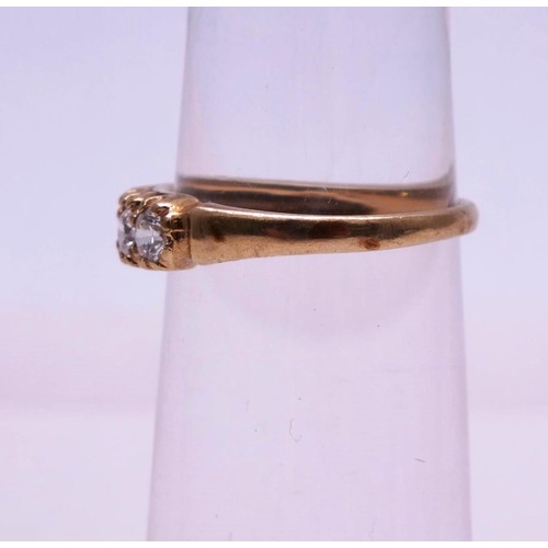 304 - 9CT GOLD RING SEVEN CLEAR STONES LONDON HALLMARKS SIZE O, 2.4g