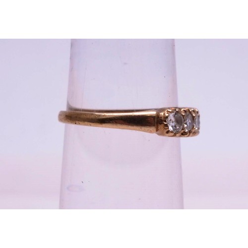 304 - 9CT GOLD RING SEVEN CLEAR STONES LONDON HALLMARKS SIZE O, 2.4g