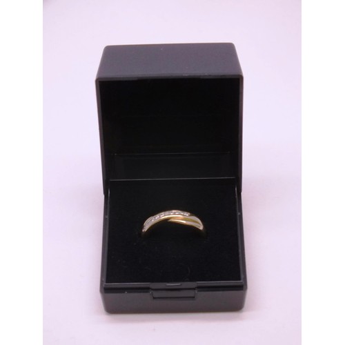 308 - 9CT GOLD & 0.15ct DIAMOND CROSSOVER RING SIZE L, 2g