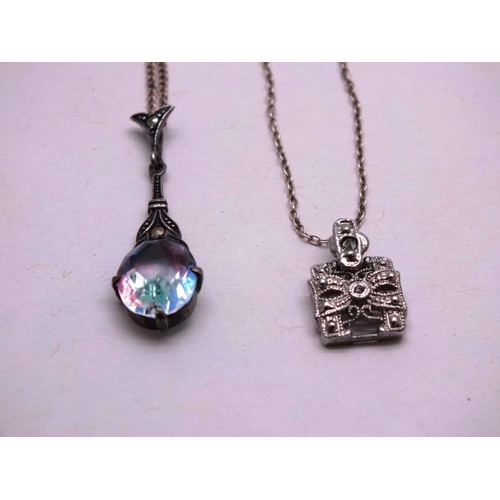 454 - TWO SILVER PENDANT NECKLACES