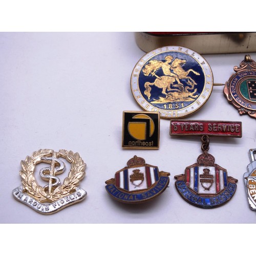 524 - ASSORTED ENAMEL BADGES DATING FROM THE EARLY 1900's