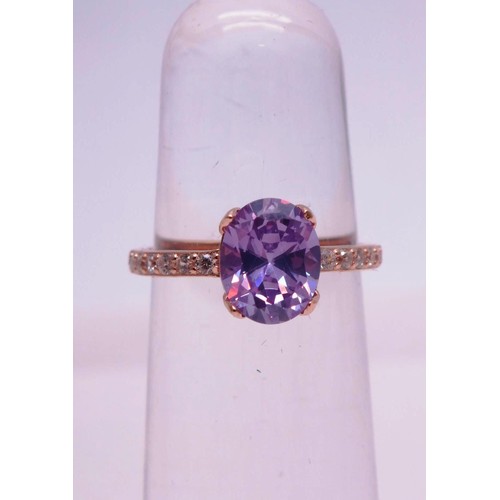 502 - 925 SILVER GILT PINK AND CLEAR GEMSTONE RING SIZE N