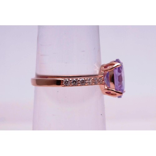 502 - 925 SILVER GILT PINK AND CLEAR GEMSTONE RING SIZE N