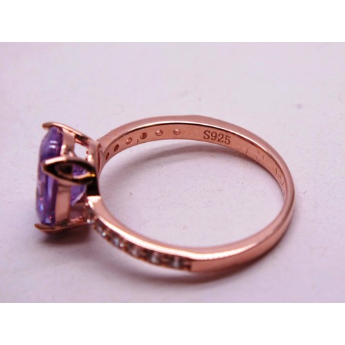 502 - 925 SILVER GILT PINK AND CLEAR GEMSTONE RING SIZE N