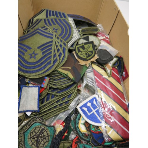 398 - BOX OF MILITARY CLOTH BADGES & PATCHES APPROX 200