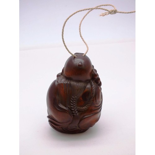 339 - CARVED CHINESE WOODEN BUDDHA