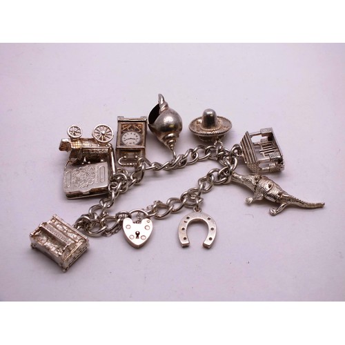 354 - VINTAGE SILVER CHARM BRACELET 66g