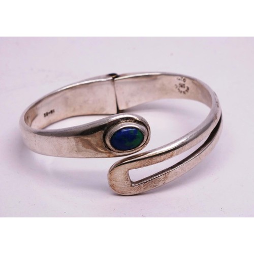 357 - THREE SILVER BANGLES 62g