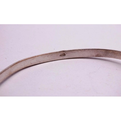 357 - THREE SILVER BANGLES 62g