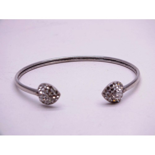 357 - THREE SILVER BANGLES 62g