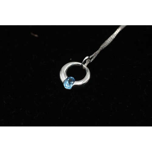 12 - 9ct white gold topaz pendant necklace (1.7g)