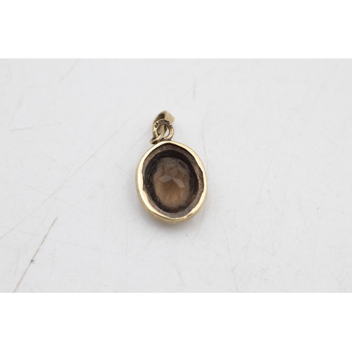 28 - 9ct gold smoky quartz pendant (1.3g)