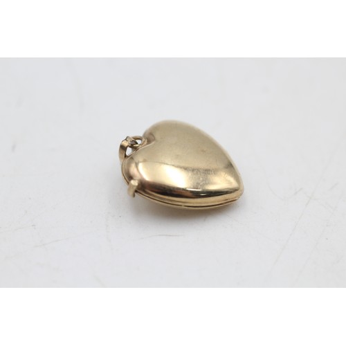 52 - 9ct gold diamond heart locket pendant (1.5g)