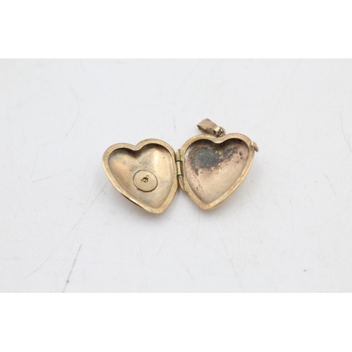 52 - 9ct gold diamond heart locket pendant (1.5g)