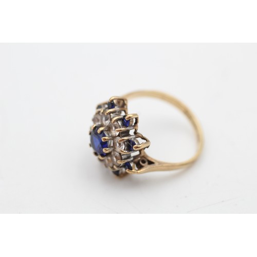 72 - 9ct gold synthetic sapphire & spinel floral cluster ring (3.1g) SIZE L