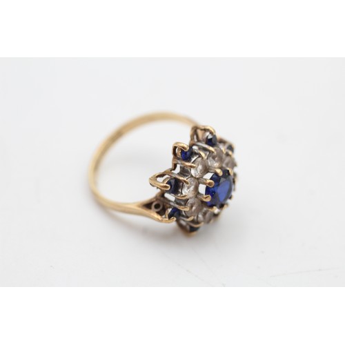 72 - 9ct gold synthetic sapphire & spinel floral cluster ring (3.1g) SIZE L