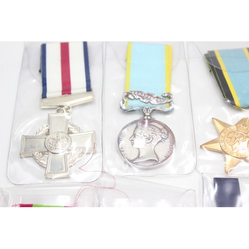 83 - 10 x Assorted Replica MILITARY Medals Inc D.F.C, D.S.C, Crimea Etc