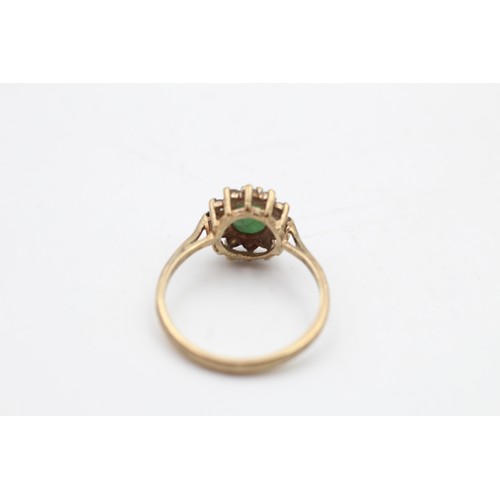 88 - 9ct gold emerald & clear gemstone halo ring (2.1g) SIZE N