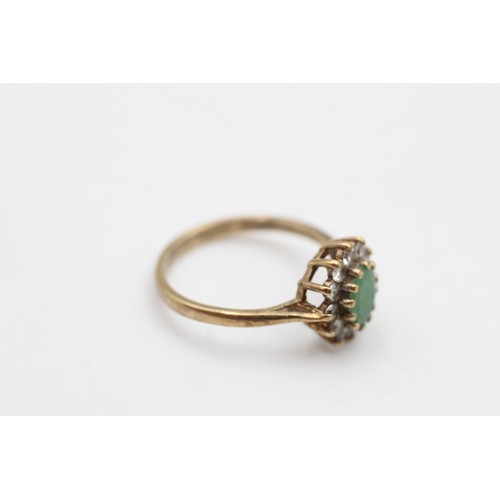 88 - 9ct gold emerald & clear gemstone halo ring (2.1g) SIZE N