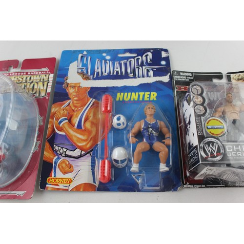 110 - 5 x Assorted CARDED Sport Action Figures Inc. Wrestling, Baseball & Gladiators