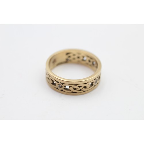 136 - 9ct gold diamond celtic knot band ring (3.8g) SIZE N