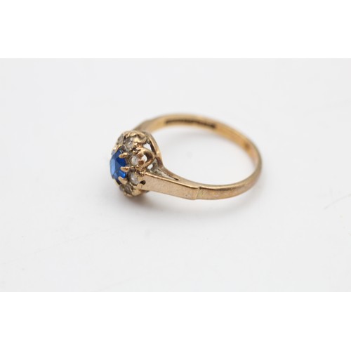 144 - 9ct gold blue & clear synthetic spinel halo ring (2.3g) SIZE L