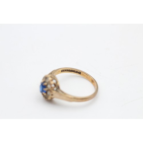 144 - 9ct gold blue & clear synthetic spinel halo ring (2.3g) SIZE L