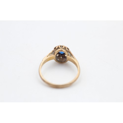 144 - 9ct gold blue & clear synthetic spinel halo ring (2.3g) SIZE L