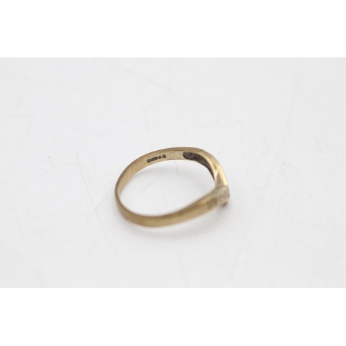 156 - 9ct gold diamond wishbone ring (1.7g) SIZE N