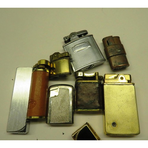 402 - TEN VINTAGE GAS AND PETROL LIGHTERS