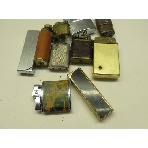 402 - TEN VINTAGE GAS AND PETROL LIGHTERS