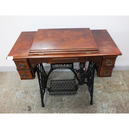 335 - INDUSTRIAL SINGER SEWING MACHINE WITH STAND