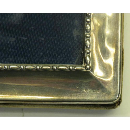 385 - TWO STERLING SIILVER EASEL BACK PHOTO FRAMES - 10