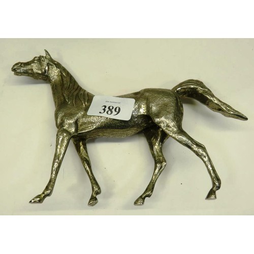 389 - SILVER PLATE HORSE SCULPTURE