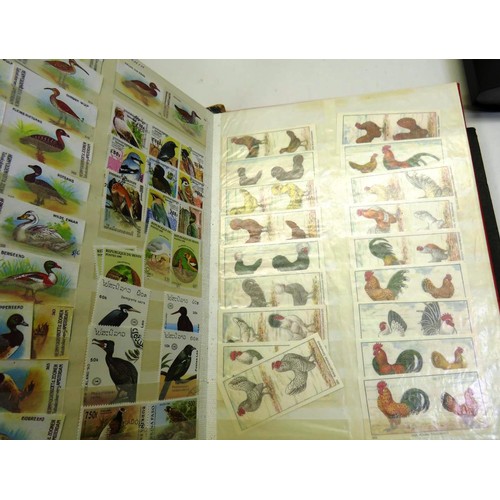 221 - FOUR STAMP ALBUMS