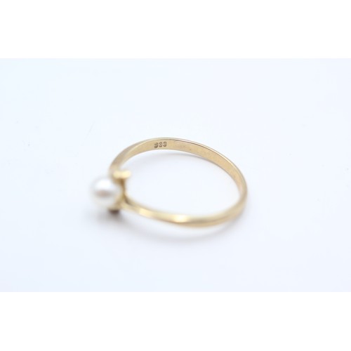 63 - 9ct Gold Pearl Twist Ring (1.7g) SIZE Q