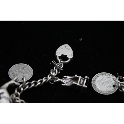 104 - Vintage .925 Silver CHARM BRACELET with Coins, Sewing Machine, Deer (47g)