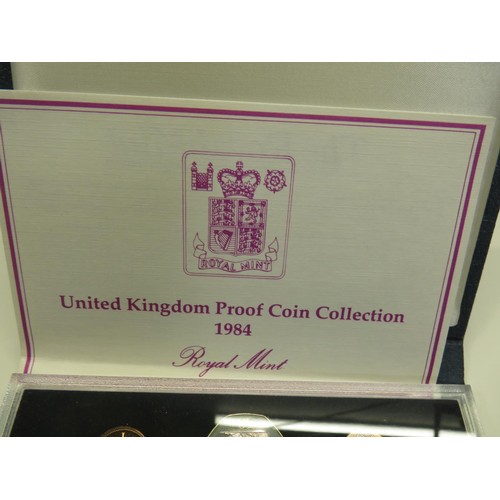 127 - 2 x ROYAL MINT PROOF COIN COLLECTIONS 1984 & 1985