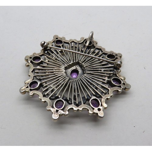 212 - SILVER AND AMETHYST ORNATE BROOCH