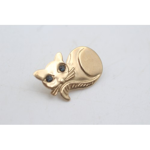 434 - 9ct gold blue paste cat brooch (0.8g)