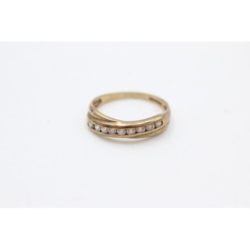 452 - 9ct gold clear gemstone half eternity ring (1.8g)