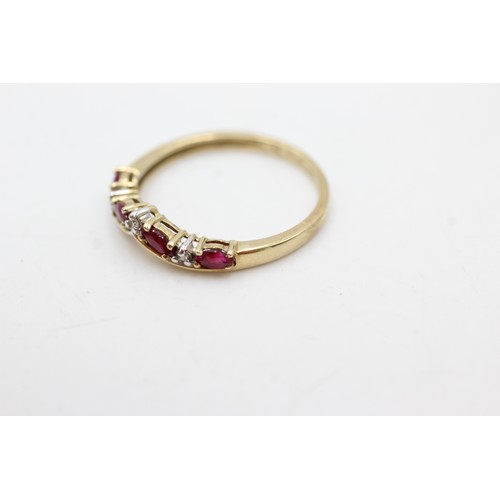 454 - 9ct gold diamond & ruby seven stone ring (1.6g)