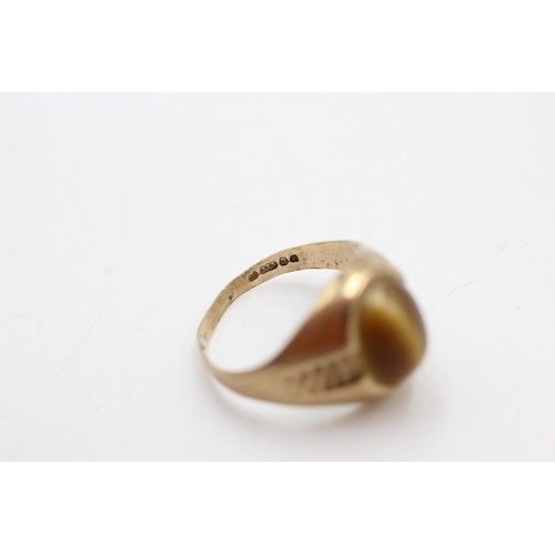 460 - 9ct gold tiger's eye oval cabochon solitaire ring (2.2g)